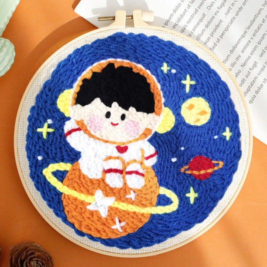 Punch Needle Kit Piccolo astronauta su Saturno Diamond Painting